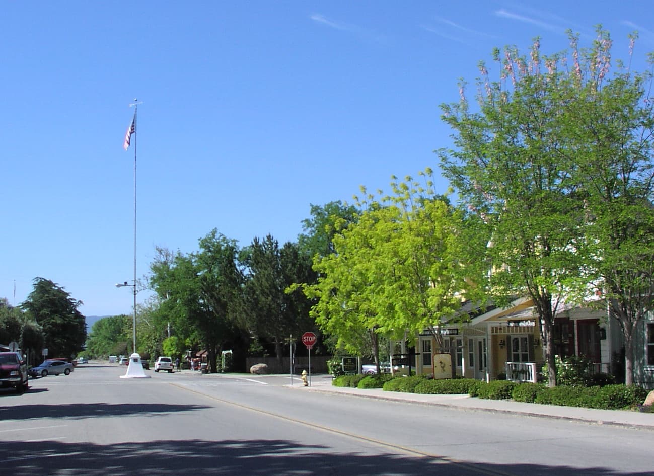 The central flagpole and street of Los Olivos, California, a small wine country village in the Santa Ynez Valley